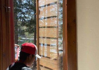 Cleaning the windows of a home in Southern California